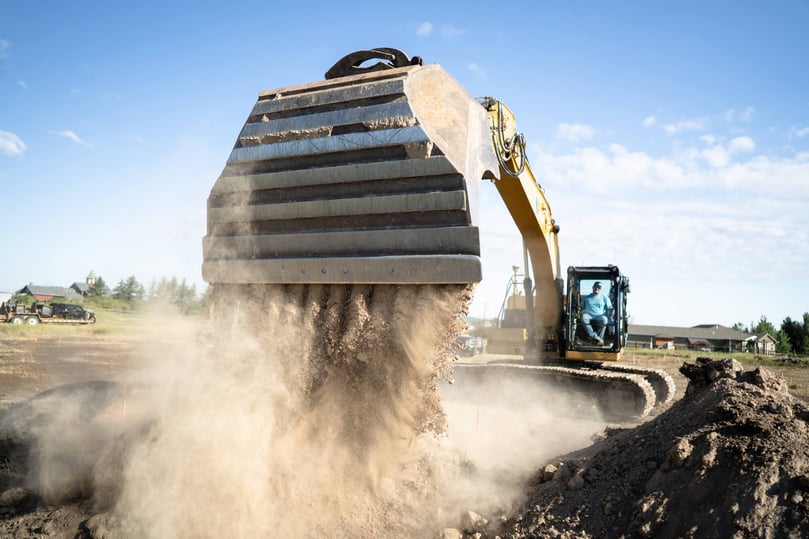 truck pouring soil