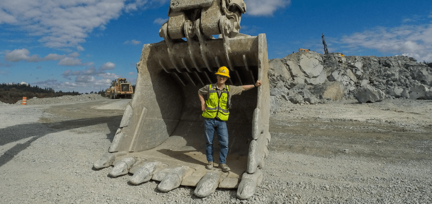 Aaron Witt in Excavator Bucket