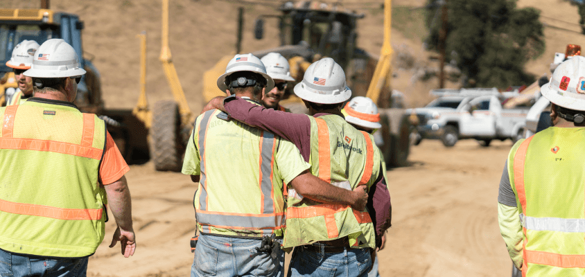 Construction staff celebrating